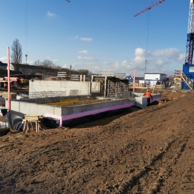 Neubau einer Wohnanlage mit 15 Reihenhäusern und Tiefgarage