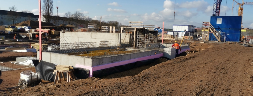 Neubau einer Wohnanlage mit 15 Reihenhäusern und Tiefgarage